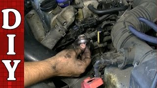 How to Remove and Replace a Thermostat - Kia Spectra 1.8L Engine