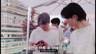 Jimin Holding Up The Bottel Of Alcohol Megan Gifted Them And Sticking His Tongue Out