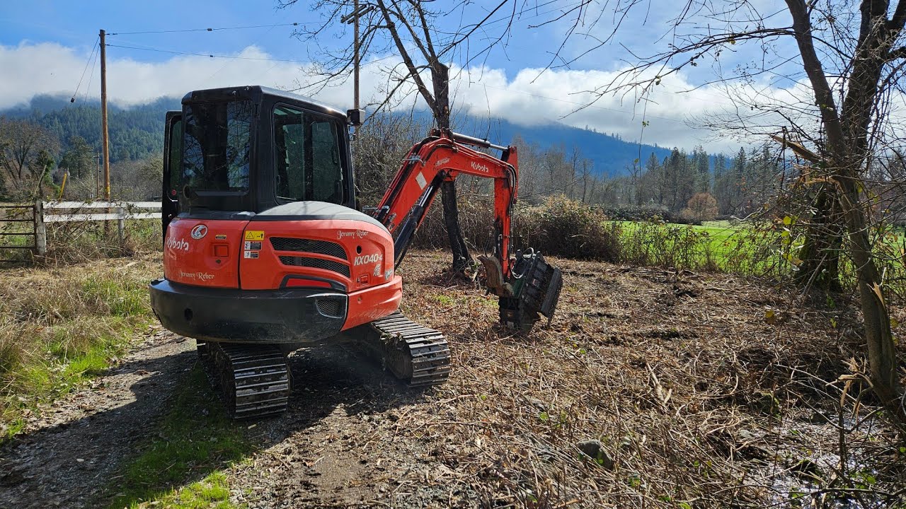 A smooth day mulching with the Kubota KX 040 4 and Brush Hound FX26 Defender