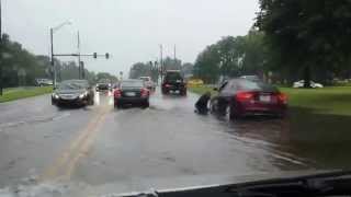 Drivers navigate rain-flooded Wichita streets