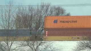 CSX Q167 Intermodal Train Westbound on Elevated Tracks