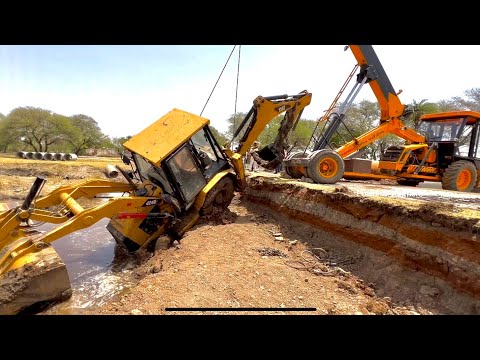 JCB नदी में फसी क्रेन ने खींच के निकाली cat jcb stuck in river pulled hydra escort