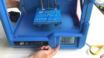 QIDI X-one2 cleaning the clogged filament in the extruder