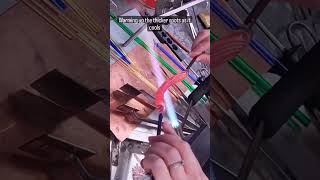 pulling some lampwork twist glass cane