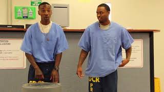UNDERDOGS: Levi and Kiyas perform a rap song for Pawsitive Change graduation