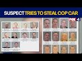Officer dragged as suspect tries to steal police vehicle