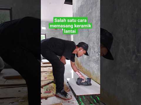 Video: Pelajari cara meletakkan ubin di lantai