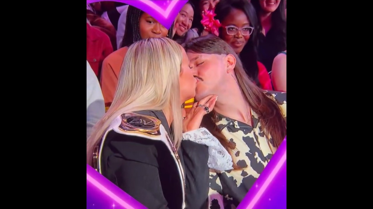 Liv Morgan and Dominik Mysterio kiss on live TV 