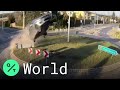 Car flies after it hits roundabout in poland