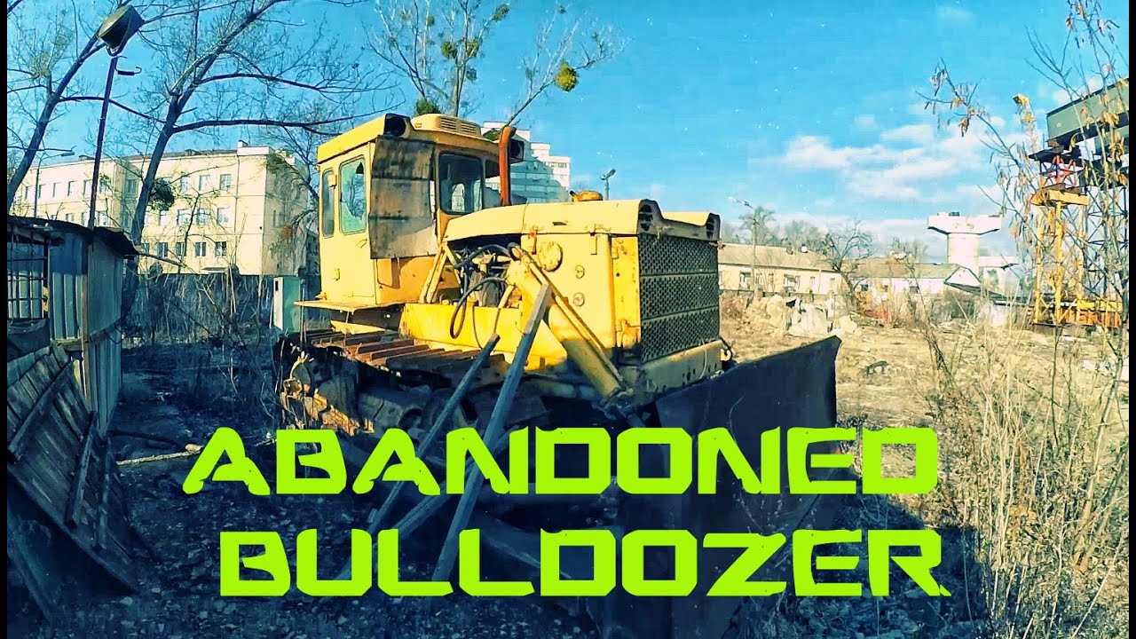 Abandoned bulldozer. Abandoned dozer. Abandoned construction area. Forgotten construction