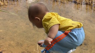 A well-behaved 6-month-old baby stays home alone, waiting for mom to return from work