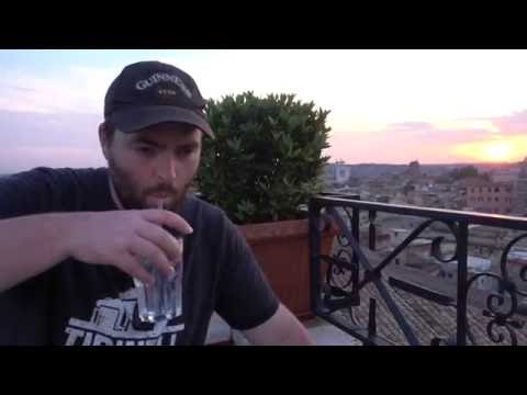 Rome, Italy - Sunset View from Hotel Colosseum Rooftop Terrace with Caipirinha and Gin & Tonic
