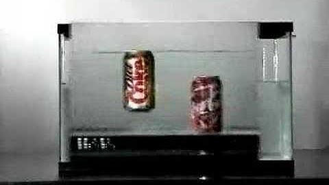 Why does the diet coke float while the classic coke sinks?