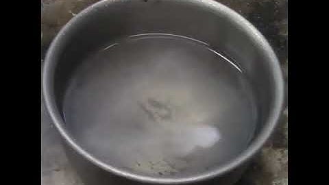 Spoon of liquid nitrogen in a bowl of  gasoline