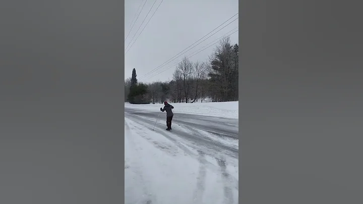 Sliding down icy road