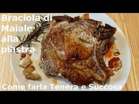 Come fare Braciole di maiale morbide con osso alla piastra. Ricetta Bistecca tenera e succosa.