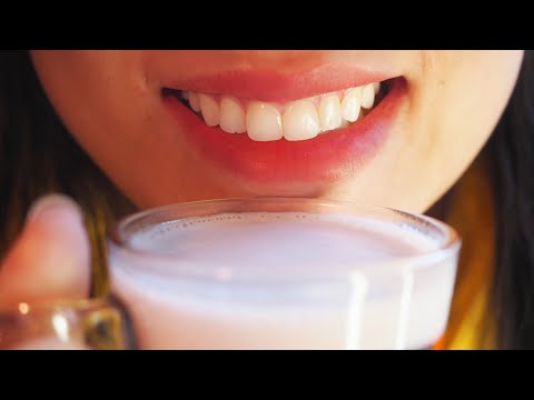 Drinking yogurt. Camera close up. Open mouth. Warning burping!