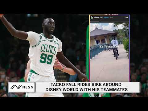 Tacko Fall Rides Bike Around Disney World With His Teammates