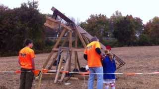 Launching a pumpkin with a trebuchet at the Forest Hill "Pumpkin Chunkin" event.