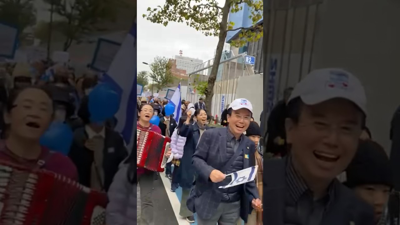 Japan rally in support of Israel. Singing Dovid Melech Yisrael. 