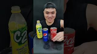 Uống C2 Cùng Lon Coca Pepsi