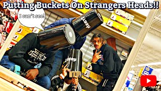 Putting Buckets On Strangers Heads! (We got kicked out)