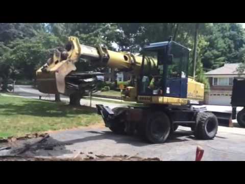 Ripping asphalt. - YouTube