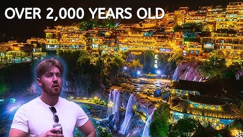 Visiting the Ancient Chinese Town built on a Waterfall 🇨🇳