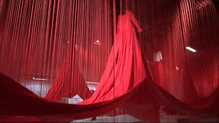 Installation featuring countless red threads opens at Austrian ex-Nazi death camp | AFP