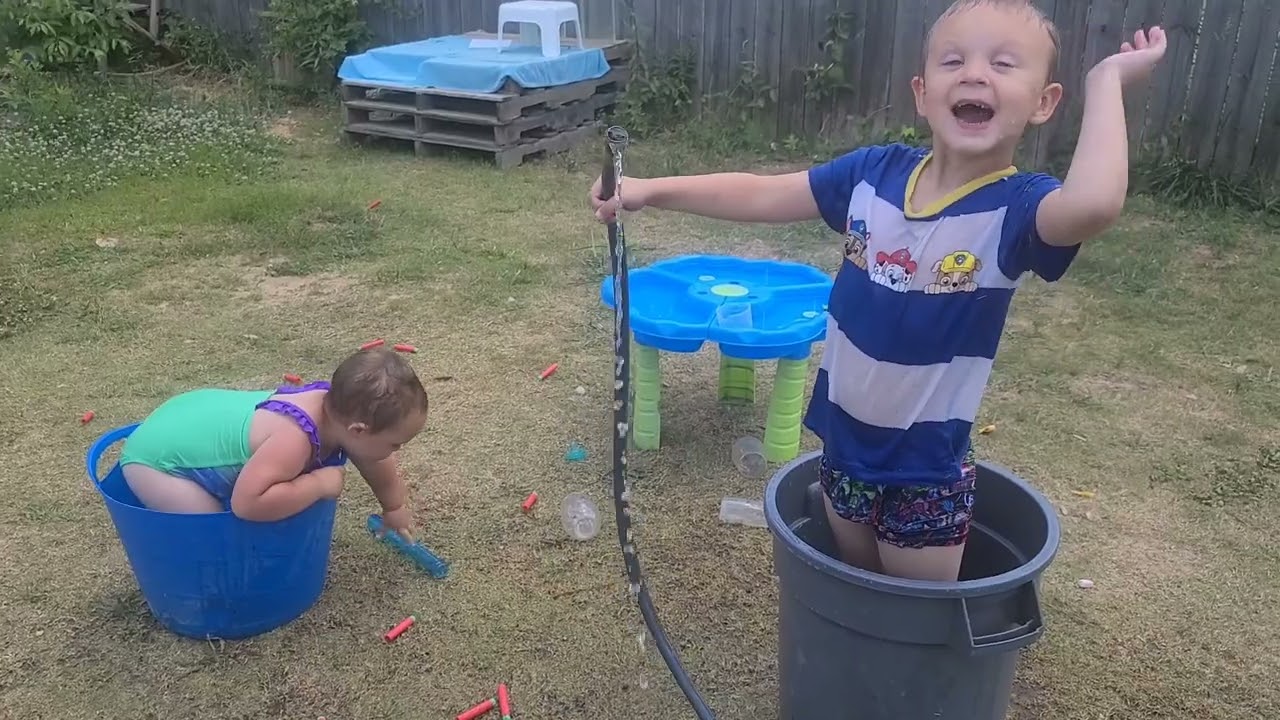 Bo and Elizabeth backyard water fun