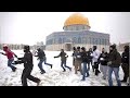 Al aqsa  mosque covered by snow  jerusalem blanketed in white after rare snowfall