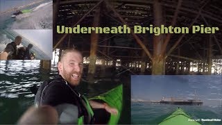 JetSki and kayak underneath Brighton Pier