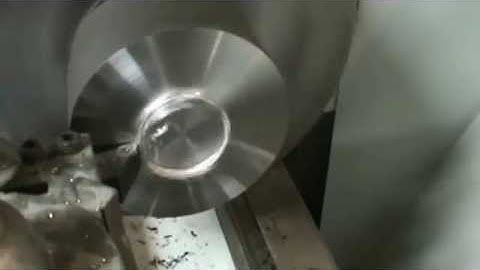 Clausing Colchester 21x100 lathe, shown cutting face of steel.