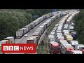 Lorry gridlock in Kent to continue for days - after France and UK agree tests for drivers - BBC News