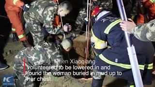 Firefighter gets into 45-meter well to rescue woman