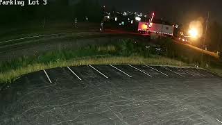Semi-truck’s trailer split in half by train