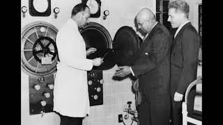 Henry J. Kaiser (center) with Dr. Sidney R Garfield (right) examining a sterilization autoclave