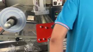 flow packing machine with shrinking tunnel for wrapping disposable crystal tableware