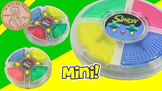 Clear Mini Simon Handheld Game Compared T0 The Original Version