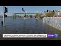 Onlookers marvel as downtown Davenport is submerged in feet of water