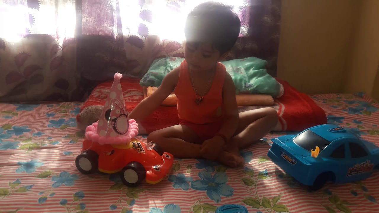 Baby with car playing video YouTube