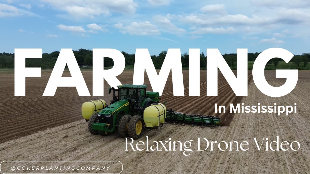 John Deere Tractor pulling up rows for planting!