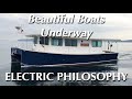 Electric philosophy  solarelectric cruising catamaran by devlin  beautiful wooden boats underway