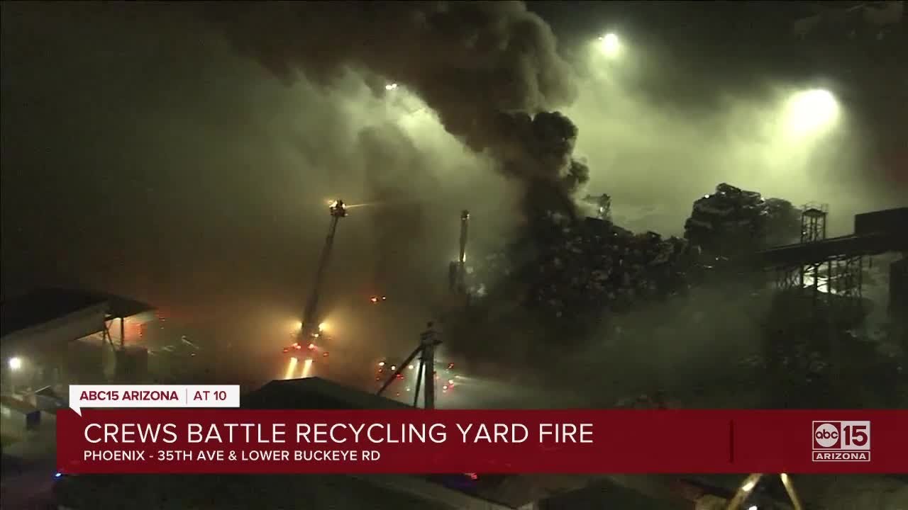Crews battle large metal recycling yard fire in Phoenix Friday - YouTube