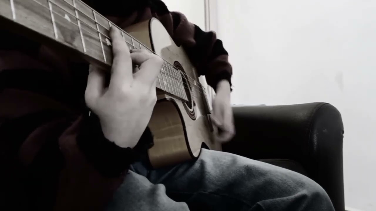 And I love her (solo)- Boy plays guitar