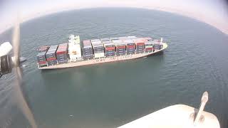 Follow the ship all the way into the port