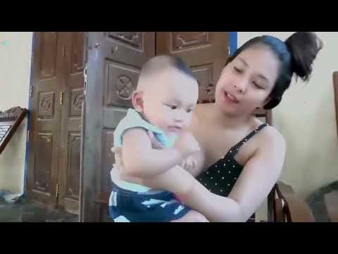 Asian Mom Breastfeeding Her Cute Baby 😘