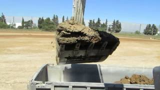 Volvo EC480E loading trucks  Cab view