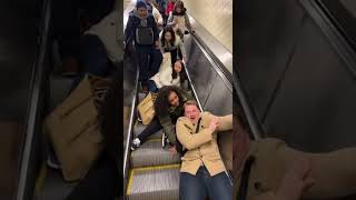 Why did the woman behind fall on purpose ?