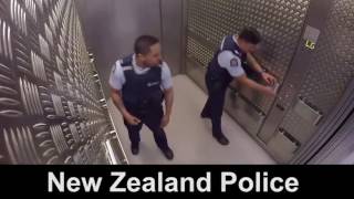 Police officers dancing in elevator (musical)